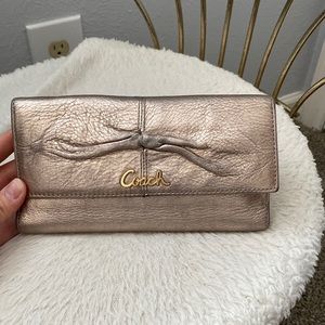 Used, Authentic Coach rose gold wallet